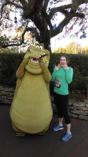 Kelly with Louis the Alligator at Mile Nine of the Disney Half Marathon.